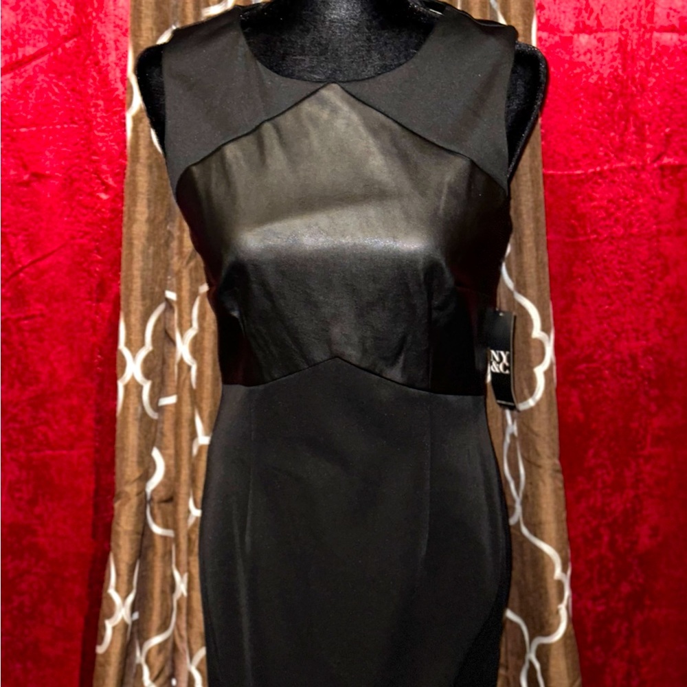 Sleeveless sheath dress with faux leather accent